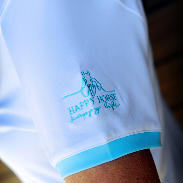 Light up the barn with your style, hit the trail with your bold colors, and be the envy of your equestrian friends at lunch or dinner. “Where did you get that amazing shirt?” The Happy Horse designer polo line lets’ you shine wherever you choose to play!