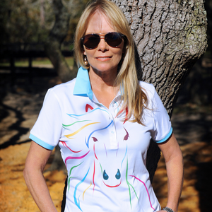 Light up the barn with your style, hit the trail with your bold colors, and be the envy of your equestrian friends at lunch or dinner. “Where did you get that amazing shirt?” The Happy Horse designer polo line lets’ you shine wherever you choose to play! 